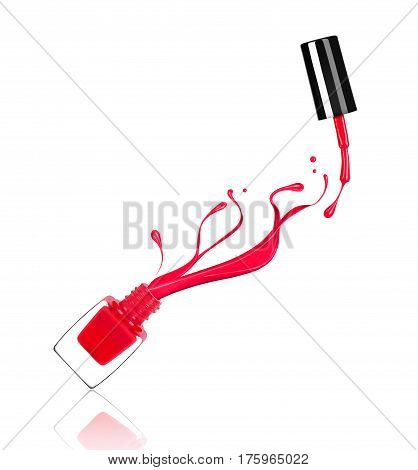 Splashes of nail polish froze in motion on white background