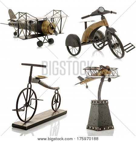 Decorative figurines, statuette of a bicycle and an airplane, accessories for an interior, isolated white background