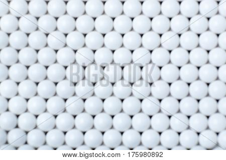 Blurred Background Of White Balls. Airsoft 6Mm