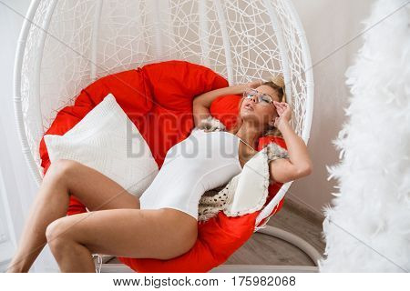 Beautiful girl sexy blonde in lingerie posing in the bathroom