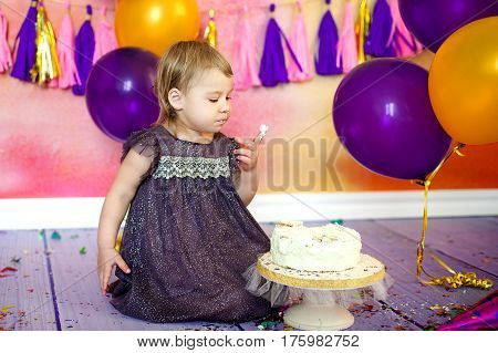 Happy Fancy Beautiful cute baby girl celebrates birthday two year.