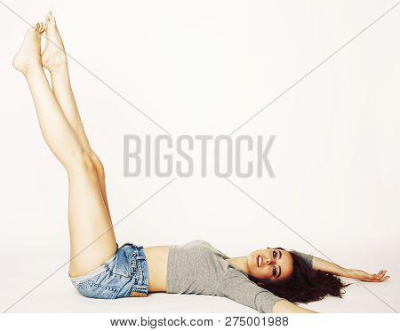 Young Pretty Brunette Woman Head Over Heels On White Isolated