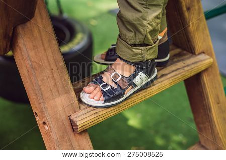 Childrens Orthopedic Shoes On The Boys Feet