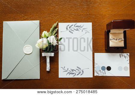 Stylish Invitation Card With Envelope, Rings And Boutonniere Groom