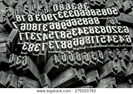 numbers in old, grunge, dusty letterpress metal typer
