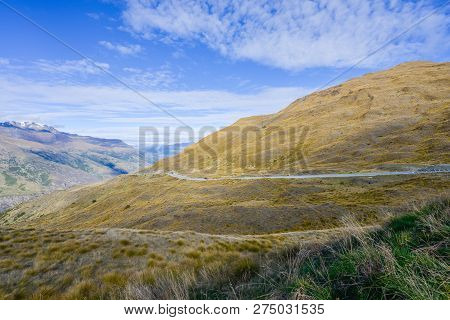 Valley Is Covered With Brown Grass In New Zealand