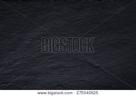 Dark Gray Black Slate Background Or Texture Of Natural Stone. Black Board For Serving Close-up