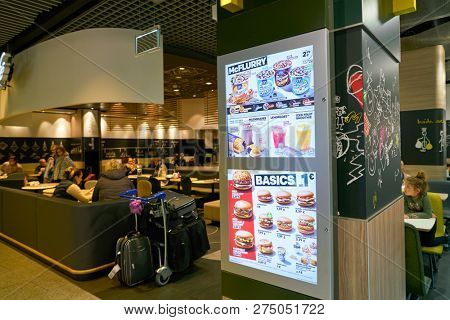 DUSSELDORF, GERMANY - CIRCA OCTOBER, 2018: McDonald's restaurant in Dusseldorf airport.