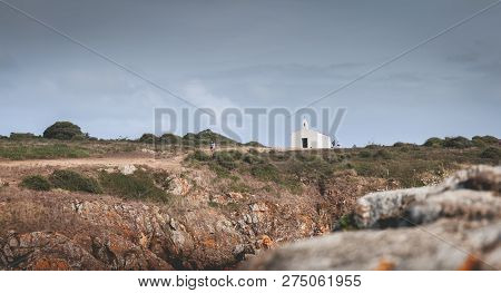 Tourists Visiting The Surroundings Of La Meule Chapel Near Island Of Yeu