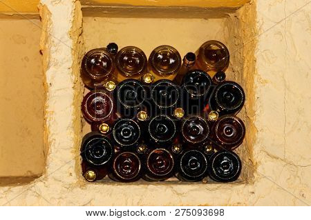 Many Champagne Bottles In A Wine Cellar