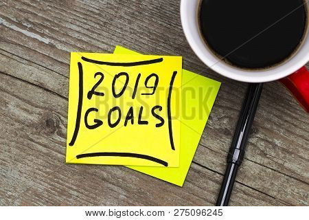 2019 Goals - Handwriting In Black Ink On A Sticky Note With A Cup Of Coffee, New Year Resolutions Co