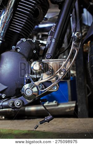 Cropped Close Up Shot Of Beautiful And Custom Made Motorcycle In The Workshop