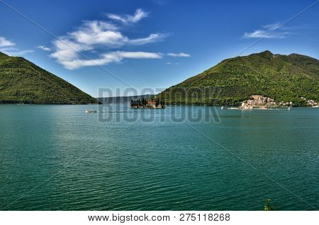 Perast is an old and little town on the Bay of Kotor in Montenegro. It is situated a few kilometres of Kotor and is noted for its proximity to the islets of St. George and Our Lady of the Rocks.