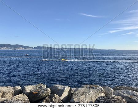 View From The Pier With Boats At The Distance In Sanxenxo Galicia Spain
