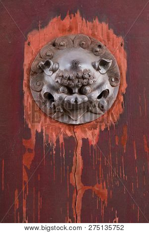 Nagasaki, Japan - October 22, 2018: Traditional lion decoration at the Ryugumon Gate of the Sofukuji Temple  