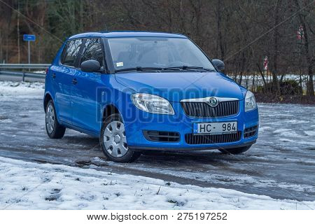 Blu Skoda Fabia To Street, Trees An Way. Winter, Travel Photo 2012.