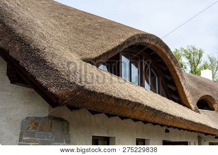 Traditional Thatched Roof From Reed, Sunny Summer Day