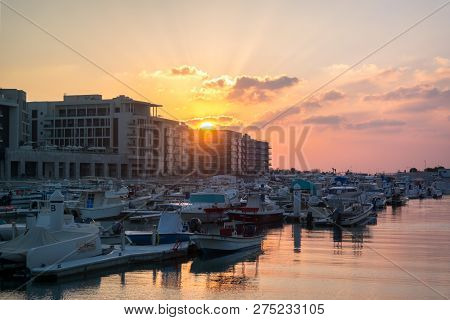 Beautiful view of city Marina boats and modern apartment buildings at sunset, Abu Dhabi Al Bateen - 