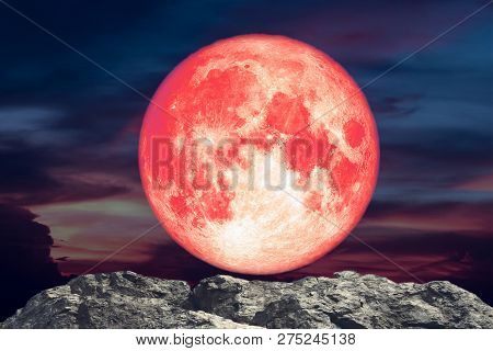 Full Blood Moon Back Over Stone Rock Of Cliff