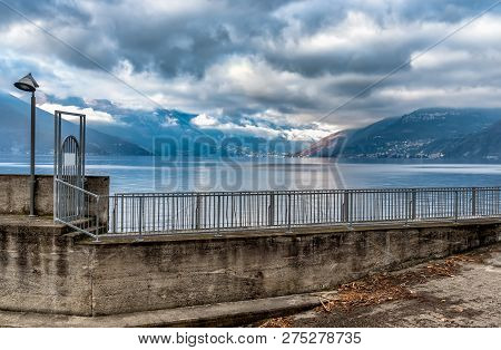Landscape Of Lake Maggiore In Cloudy Day, Luino, Province Of Varese, Italy