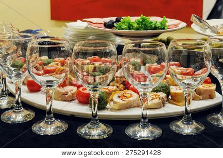 Empty Glasses With Mixed Vegetables On The Plate Background