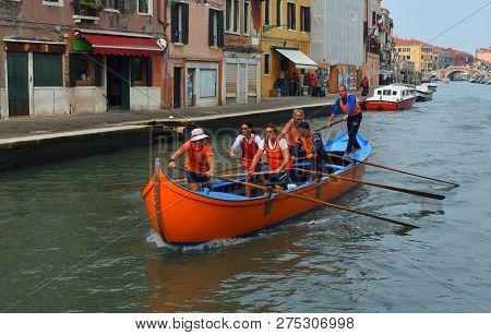 Venice, Italy -  September 23, 2017: Venetain Rowing Team On The Cannaregio Canal Venice Italy.
