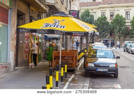 Belgrade, Serbia- 16 August 2014: People And Parked Cars On The Skadarlija - Skadarska Street. Umbre