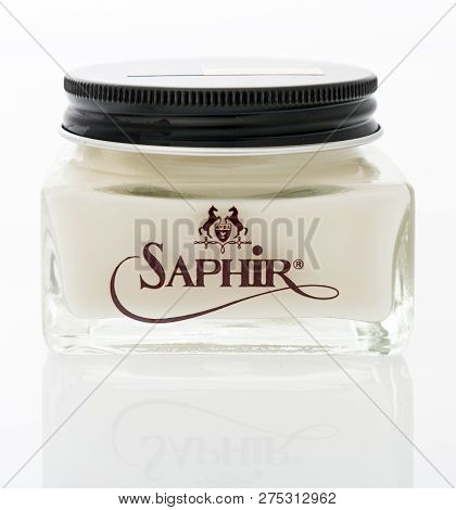 Winneconne, Wi - 21 December 2018:  A Jar Of Saphir Renovator Cream For Dress Shoes On An Isolated B
