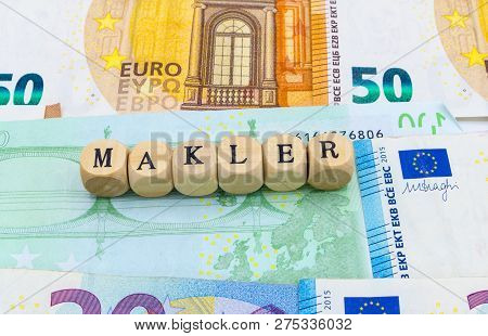 Wooden Letters On Banknotes Agent Broker German 