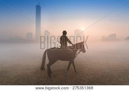 Kolkata, West Bengal, India - Hanuary 21st 2018 : Mounted Police Walking His Horse At Kolkata Maidan