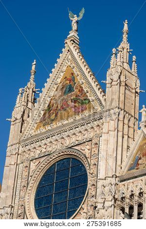 Detail Of The Facade Of The Siena Cathedral (santa Maria Assunta) 1220-1370. Tuscany, Italy, Europe