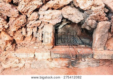 Furnace Barbecue With Volcanic Heat In Restaurant At Timanfaya National Park, Lanzarote, Canary Isla