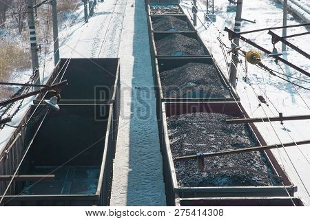 Rail Cars Loaded With Coal Transported From Nearby Mines To Power Plants In Winter