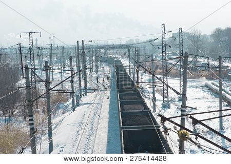 Rail Cars Loaded With Coal Transported From Nearby Mines To Power Plants In Winter