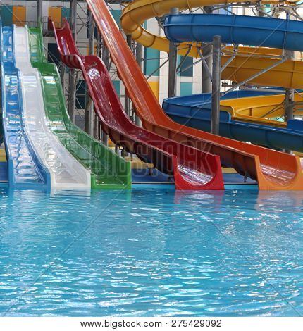 Water park. Blue pool slide swimming. Aquapark.