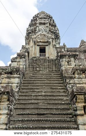 The Ogival, Redented Tower Shaped Like Lotus Bud Of Angkor Wat, And The Very Steep Stairways Represe