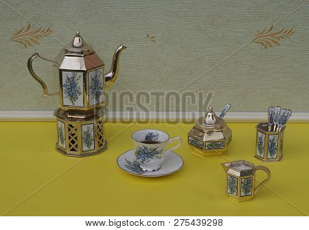 English Teacup, Saucer, Silver-plated Teapot On A Silver Stove, Spoon Vase And Teaspoon, Cream Jug, 