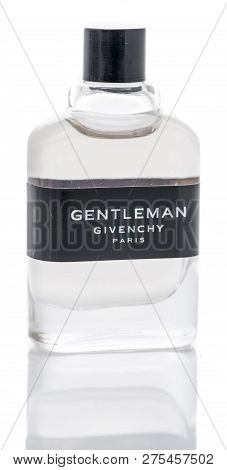 Winneconne, Wi - 10 December 2018:  A Bottle Of Gentelman Givenchy Paris Cologne On An Isolated Back