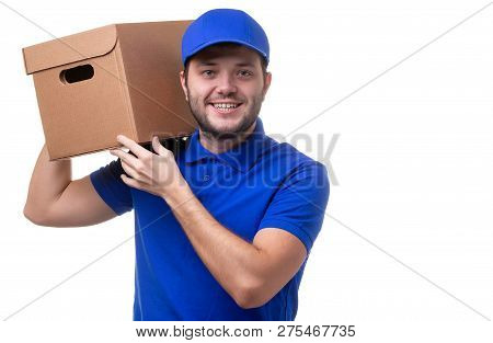 Image Of Man In Blue T-shirt And Baseball Cap With Cardboard Box On Shoulder Standing On White Blank