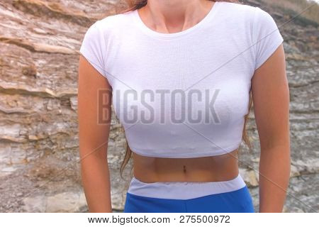 Flat Belly Girl During Breathing Exercises Bodyflex. Belly Close-up View.