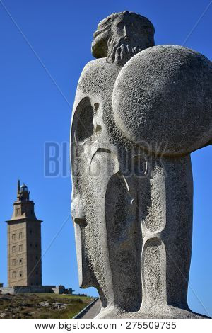 La Coruna, Spain, September 2018. Tower Of Hercules And Stone Celtic Warrior.