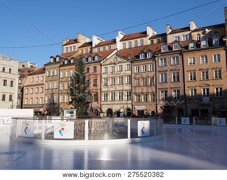 Warsaw, Poland On December 2018: Buildings At Old Town Market Place And Icerink In European Capital 