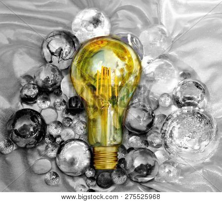 Yellow Lightbulb In Beautiful Environment With Background In Black And White