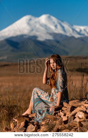 Amaizing Sexy Young Girl Sit In Field In Mountain Smiling