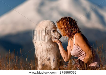 Beautiful Portrait Women Kiss Cool White Dog Morema Sit On Grass In Mountain