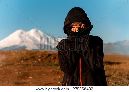 Amaizing Sexy Young Girl In Hood In Field In Mountain Smiling
