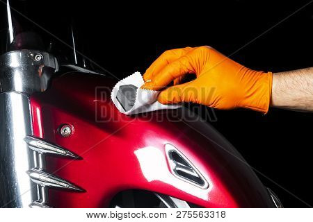 Car Polish Wax Worker Hands Polishing Motorcycle. Buffing And Polishing Vehicle With Ceramic. Car De