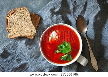 Traditional Ukrainian Russian Borscht . Bowl Of Red Beet Root Soup Borsch With White Cream On Gray R