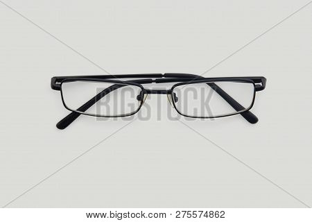 Glasses In Thin Frame On White Background.