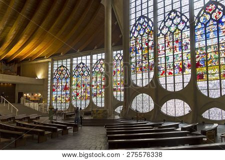 Rouen, France - August 30, 2018: Old Renaissance Stained Glass Windows In A Modern Catholic Church O